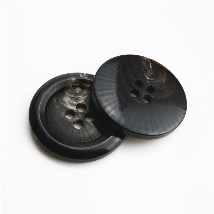 Buttuni tal-Blazer tal-Qrun